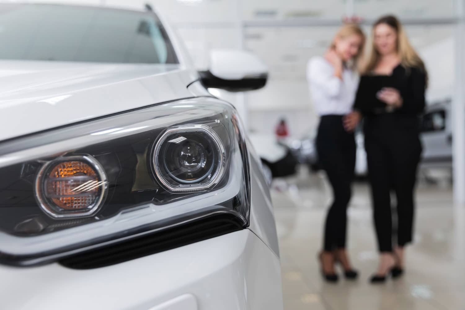 front-view-of-women-in-dealership